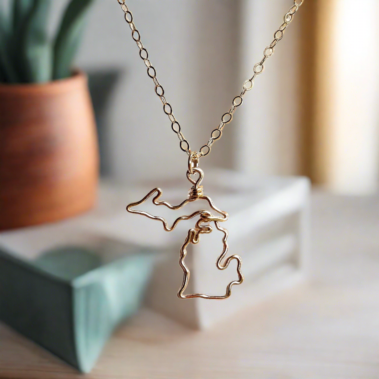 gold state of Michigan necklace the necklace is an outline made from wire