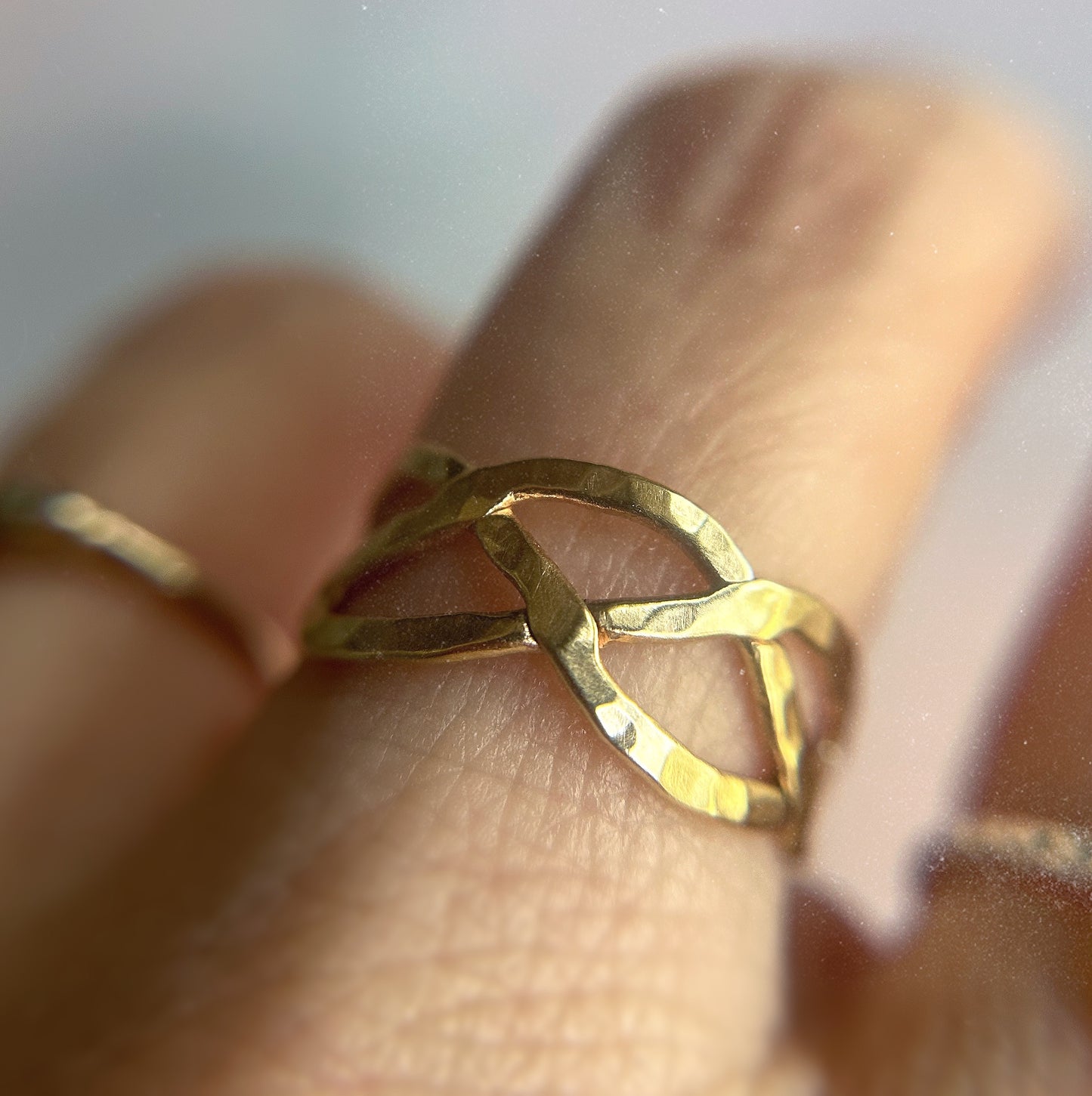 braided woven ring on finger