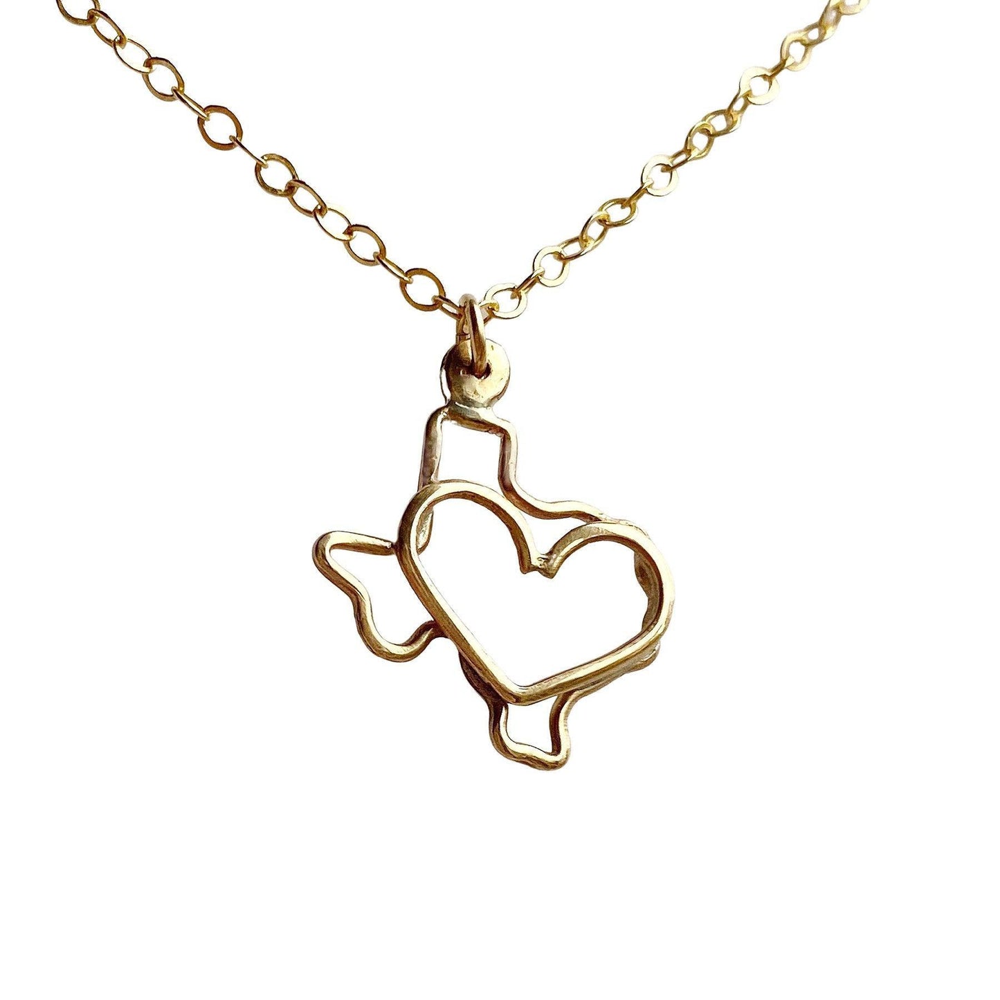 gold texas necklace with heart in the middle