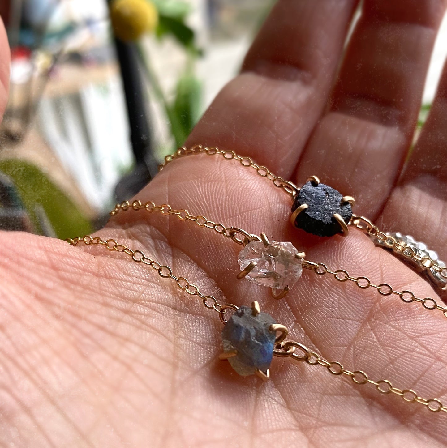 crystal energy stone necklace on a gold filled chain