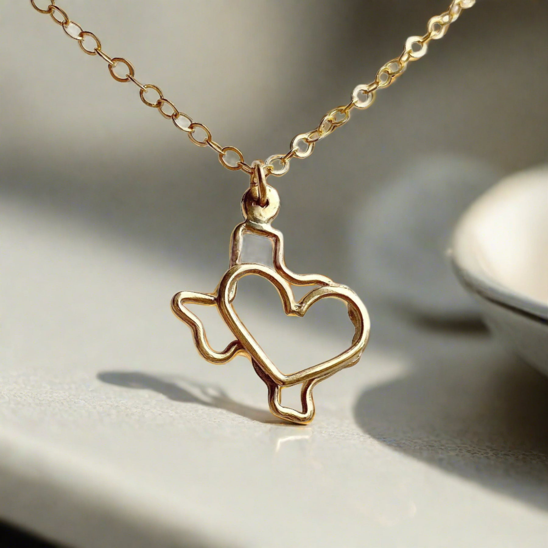 gold Texas necklace with heart with AI generated background