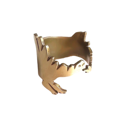 dinosaur wrap around ring featuring a stegosaurus in gold