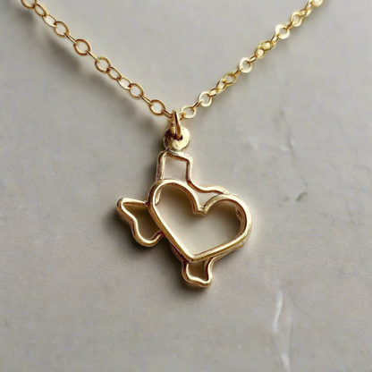 gold texas necklace on sunny surface generated by AI