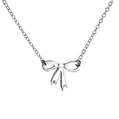 silver bow pendant, silver bow necklace on white background