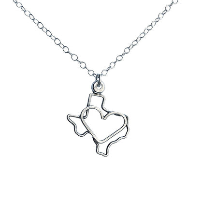 silver texas necklace with heart in the middle